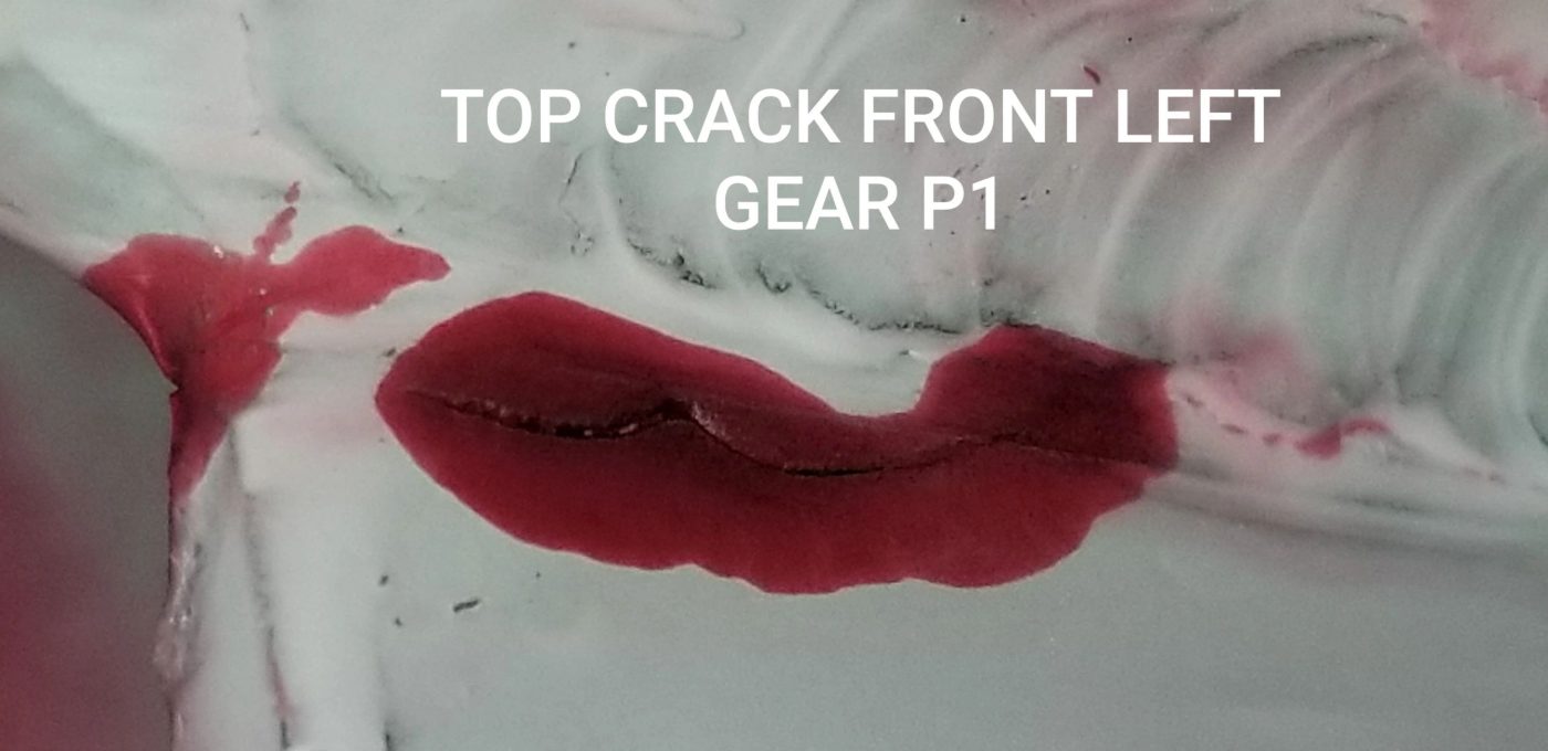 Dye-penetrant inspection showing a crack in a landing gear component